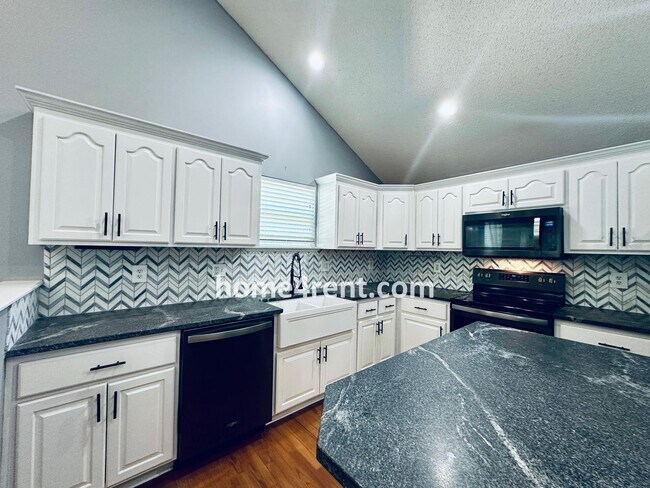 Building Photo - Overland Park Raised Ranch, Primary Suite ...