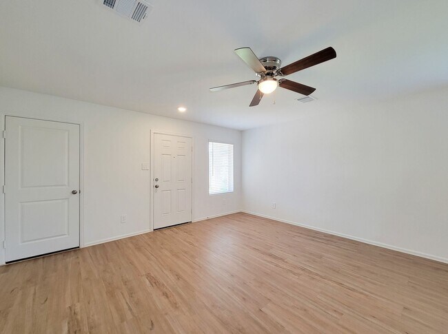 Building Photo - This single-story home has a comfortable layout with three bedrooms and a living area all on one ...