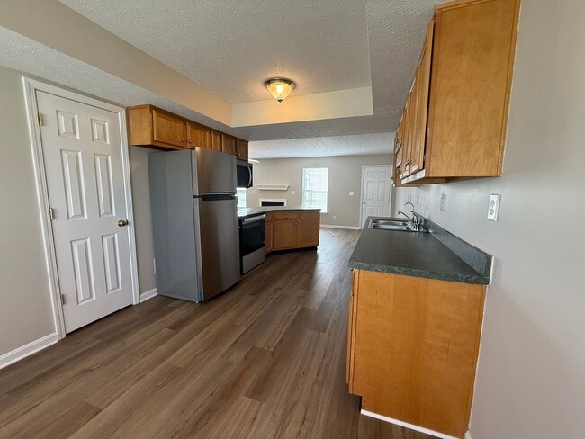 Building Photo - MOVE IN SPECIAL!! LARGE BEAUTIFUL 3 Bedroom 2.5 Bath Townhouse w/Finished Basement, Fenced in Yar...