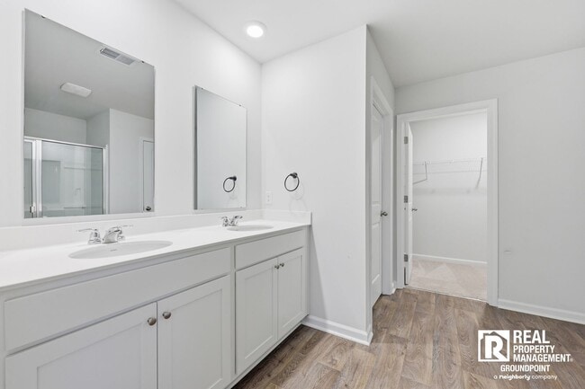 Building Photo - 4 Bedroom Rental in Cane Bay Plantation with Open Layout and Pond View