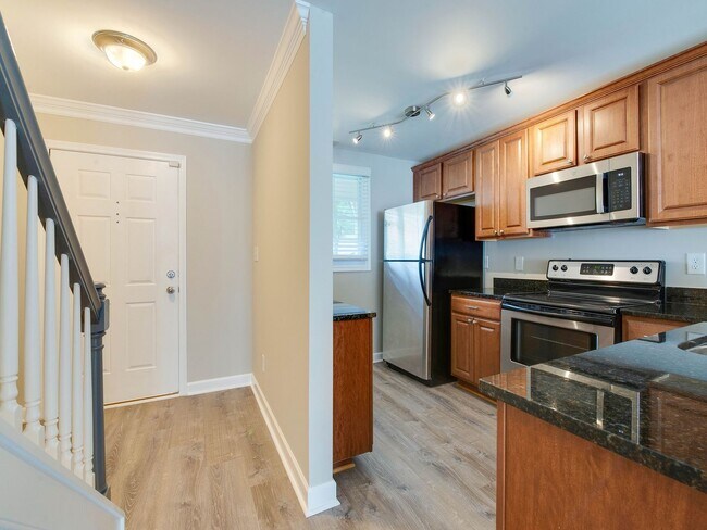 Building Photo - Stunning and completely updated townhome s...
