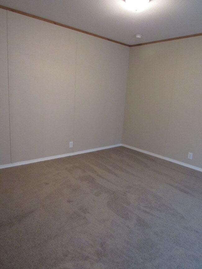 Building Photo - 3 Bed 2 bath Mills Mobile Home on Beautiful Treed Lot