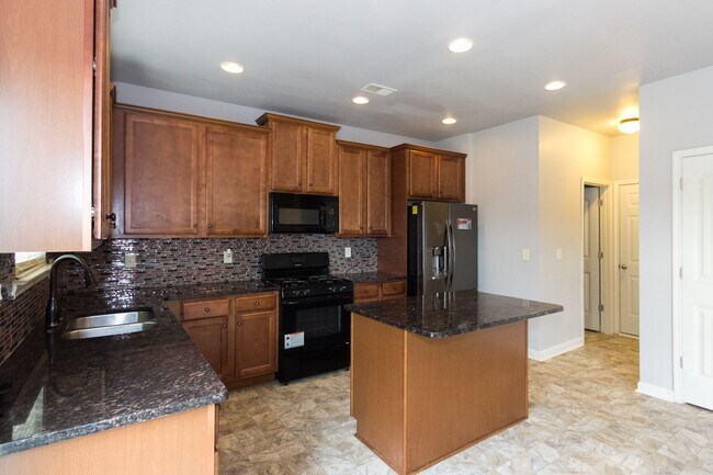 Building Photo - COMING SOON- Beautiful 4-Bedroom Home in L...