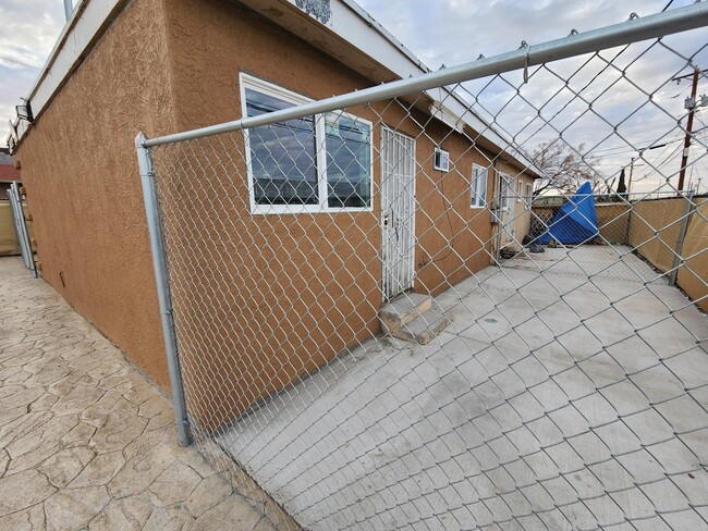 Paved & fenced backyard - 3919 Lincoln Ave