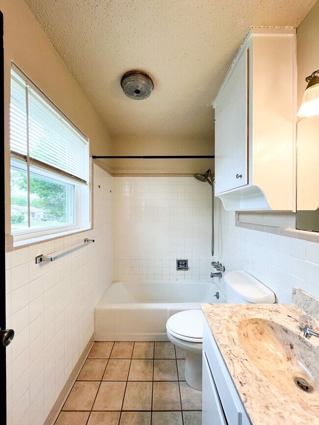 Building Photo - Available Now!!!! Gorgeous 3 bedroom, 2 bath, 2 car garage home. Beautiful wood look flooring. Sp...