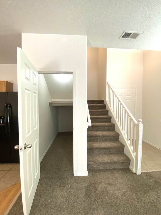 Building Photo - GATED COMMUNITY - 2 Story Townhouse - All BR Upper Level