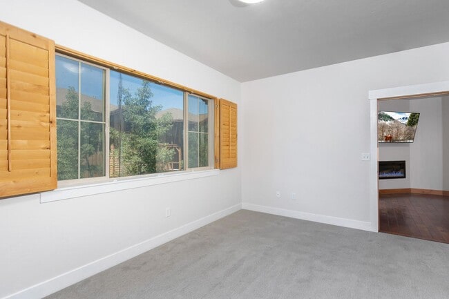 Building Photo - Unfurnished Condo Retreat with Modern Comf...
