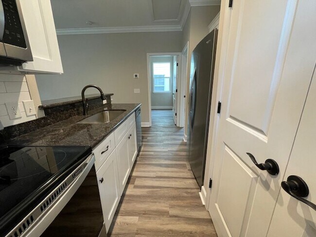 Building Photo - New Construction - Beautiful 2 Bedroom, 2 ...