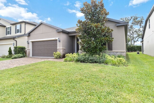 Building Photo - Gorgeous Energy Efficient 4/2 Home in Gated Community Close to Lake Nona