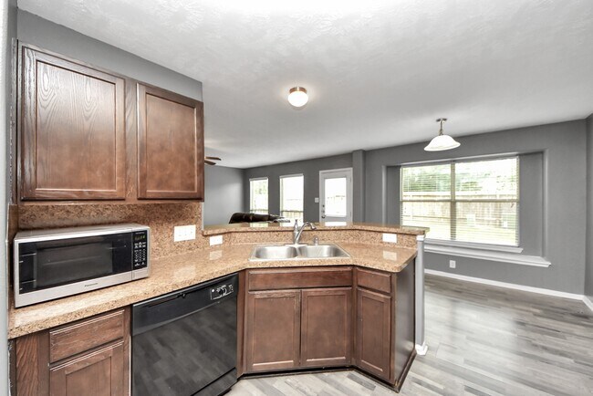 Building Photo - 9219 Dewberry Blossom Ln