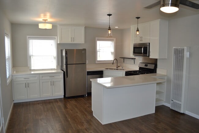 Building Photo - Upstairs Corner Apartment Home! Great North Park Location! Assigned Off Street Parking