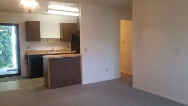 Building Photo - MOVE-IN READY! Peaceful 1-Bedroom Top Floo...