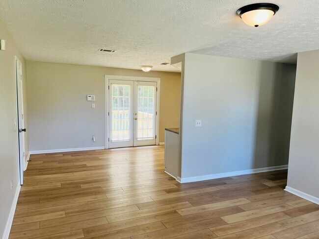 Building Photo - Wow! Check out this charming 4-bedroom, 1-...
