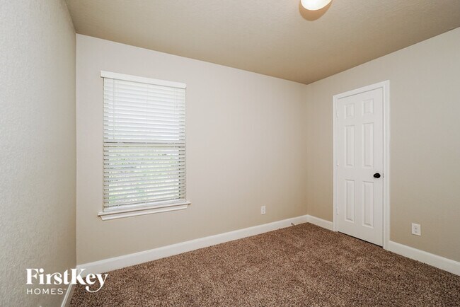 Building Photo - 6630 Woodstock Dr