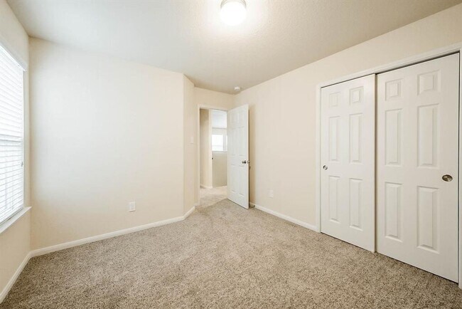Building Photo - Beautiful stone front 4 bedroom, 3 bath home has bay windows in breakfast nook & master. It is on...