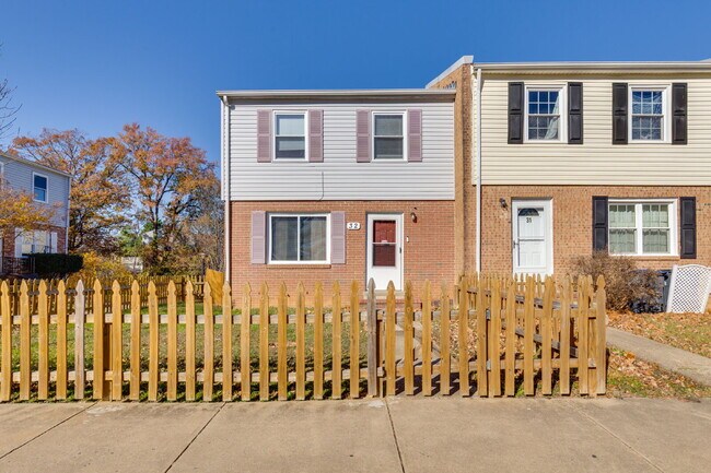 Primary Photo - Spacious end-unit three-level townhome featuring 2 bedrooms and 2.5 bathrooms