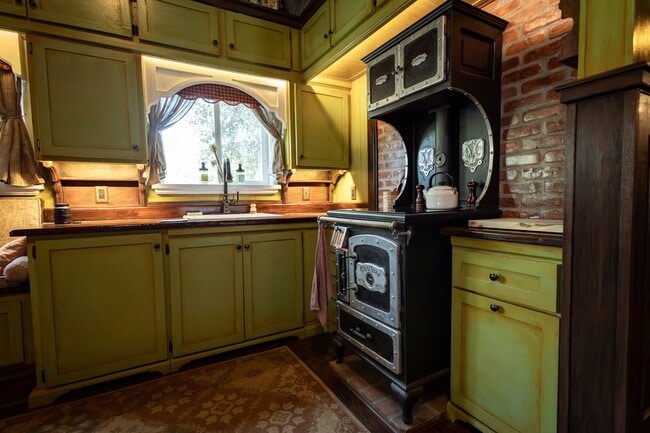 Building Photo - Move-In Ready One-of-a-Kind Custom Cabin Retreat with Loft, Deck, and Designer Interior Charm