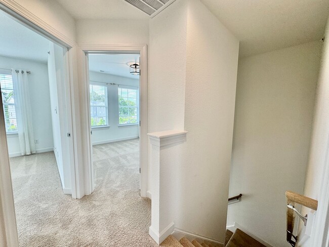 Building Photo - Practically New & Available May 1st! Luxur...