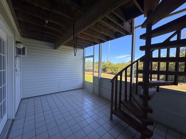 Building Photo - Coastal Luxury Awaits – 3-Story Townhome i...