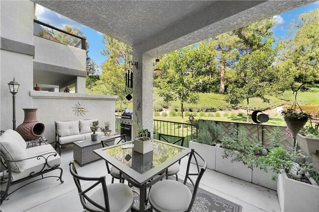 Furnished patio with grill - 27 Chaumont Cir