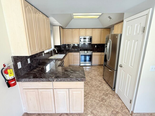 Building Photo - Spacious 4-Bedroom Home with Pool & Spa in...