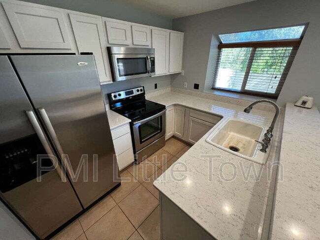 Building Photo - 9673 W Chatfield Ave