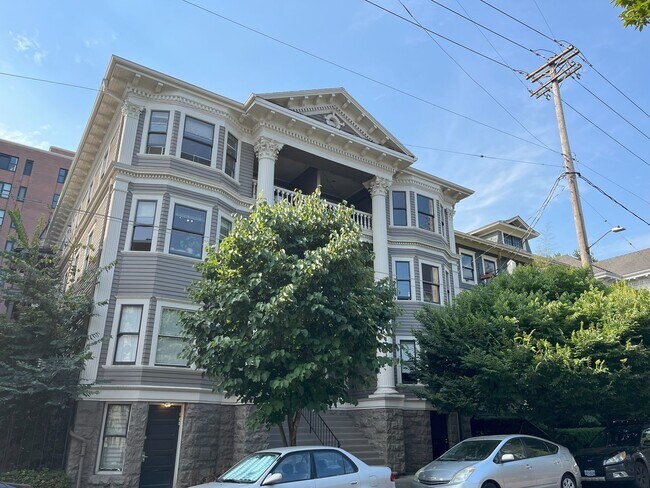 Building Photo - Charming NW Portland 1-Bedroom with Brick Accents & Modern Touches