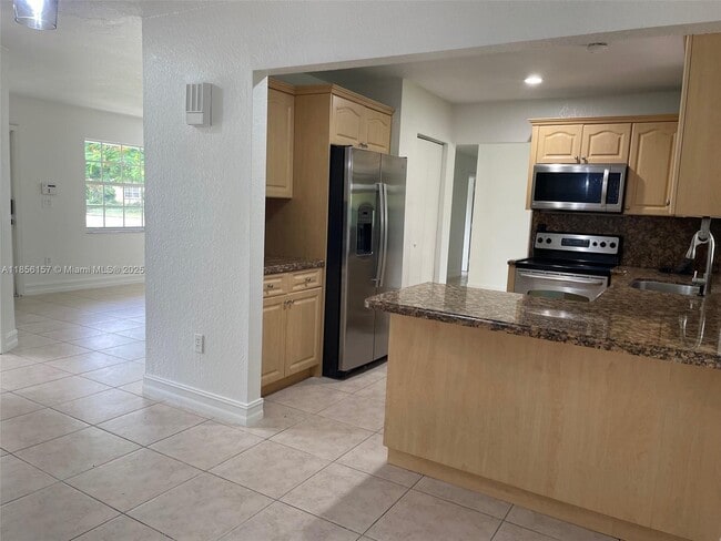 Building Photo - 14330 SW 71st Ln
