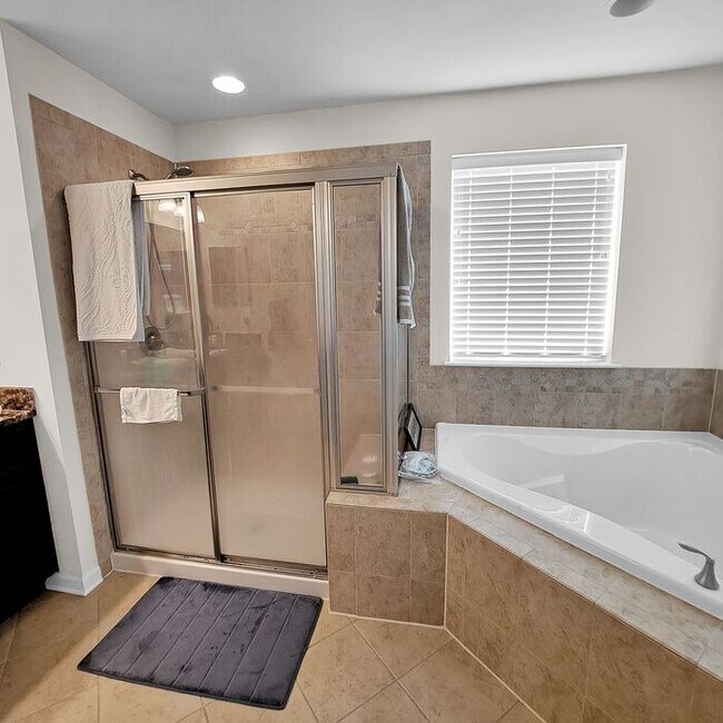 Building Photo - Stately End Unit 3-Level Townhome, 3 Bedro...