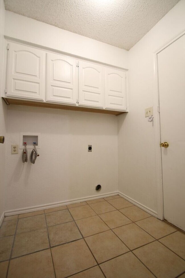 Building Photo - Corner Lot Charmer Off Chapel Creek | 4BR/2BA with Fireplace, Garden Tub & Fenced Backyard