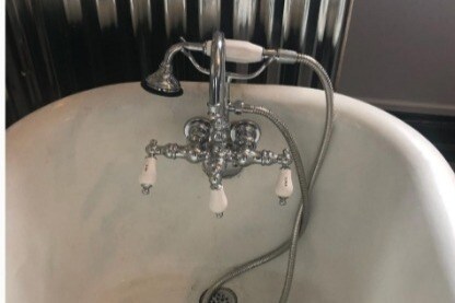 Claw foot tub - 131 S 7th St