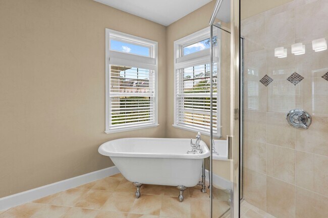 Building Photo - A Sunlit Custom Yellow Cottage in Greystone - Where Comfort Lives!