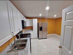 Building Photo - 1050 SW 137th Ct
