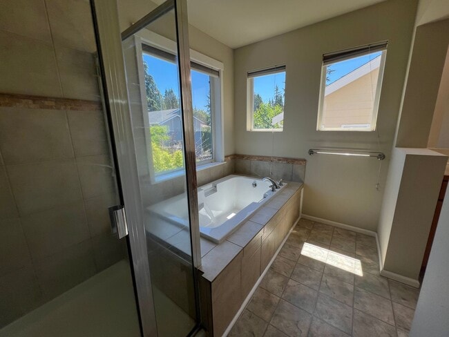 Building Photo - Spacious 4 Bedroom Home with Zen Backyard and 3-Car Garage