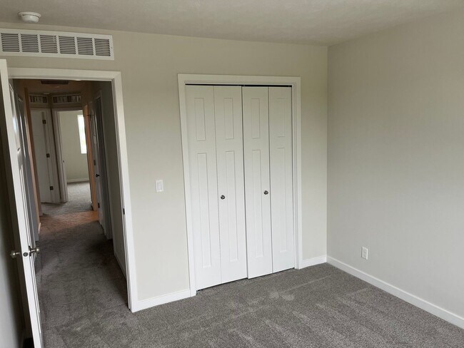 Building Photo - Spacious 5-Bedroom Duplex Near Asbury Elementary with Finished Basement & Full Amenities