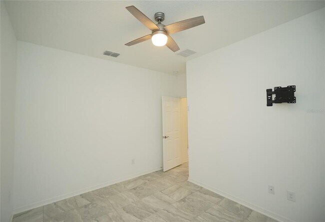 Building Photo - 7076 Gulf Cypress Ave