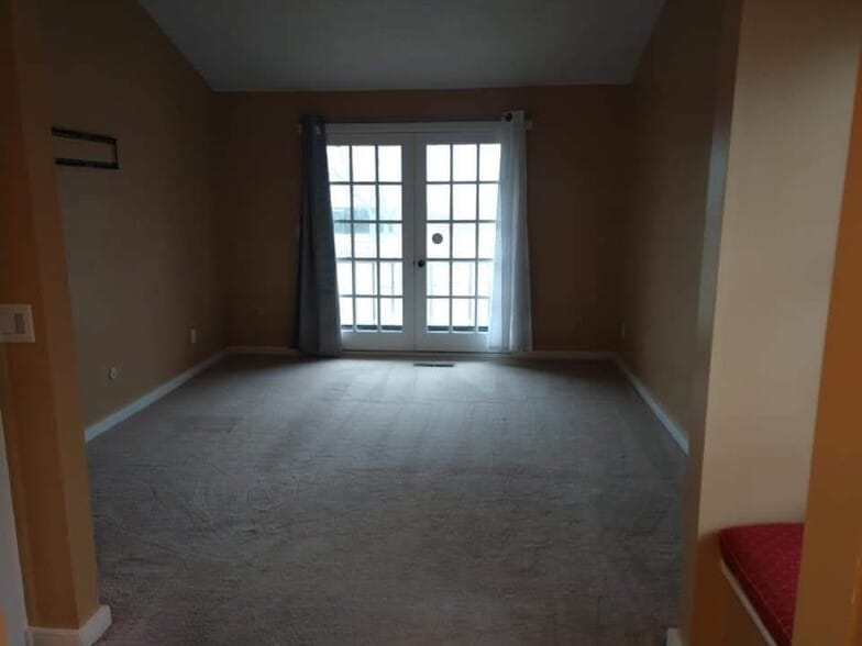 Bedroom with doors to balcony - 6212 Tennis Ct