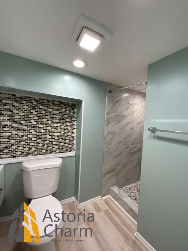 Building Photo - 3 Bed with Finished Basement, Skylight Bath, and Private Yard