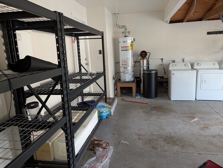 Washer, dryer, water heater and softener in garage - 487 Tuscarora Dr