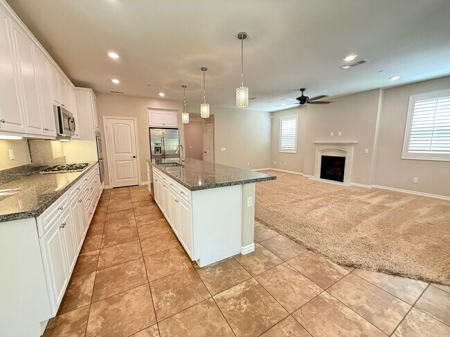 Building Photo - Stunning 4-Bedroom Home with Solar, EV Charger, and a Loft in Valencia
