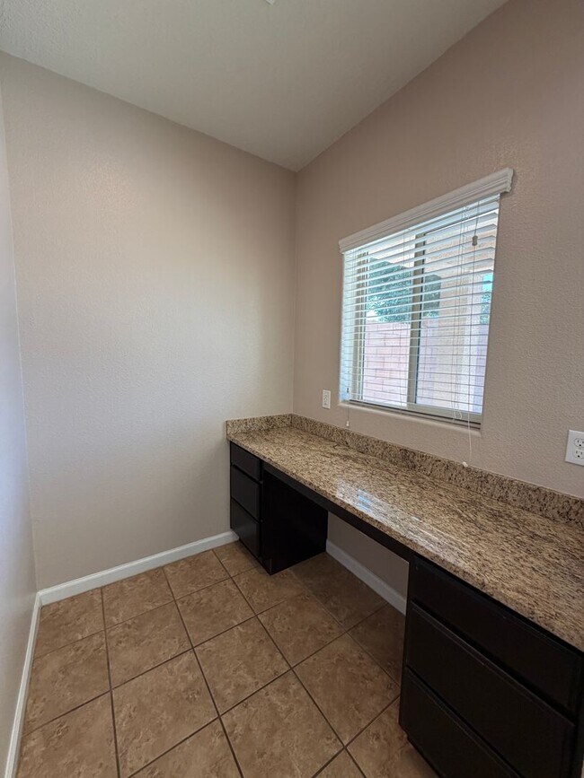 Building Photo - 4 Bedroom + Office Home Available Near Loma Colorado Blvd NE & Broadmoor Blvd NE in Rio Rancho!