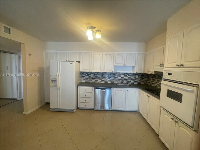 Building Photo - 19380 Collins Ave