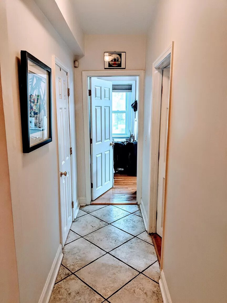 View down back hall to back BR - 6 Porter Rd