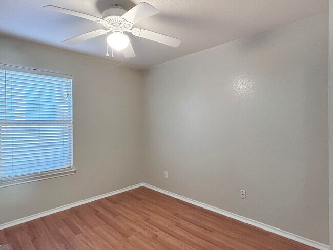 Building Photo - Northeast 3/2 with New Bedroom Floors & Covered Patio