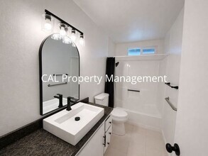 Building Photo - Spacious 4-Bedroom Home with 2-Car Garage & Backyard Oasis