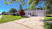 Building Photo - Bright & Spacious 3/2 Home with Huge Yard + Screened Patio — Lawn Care Included!
