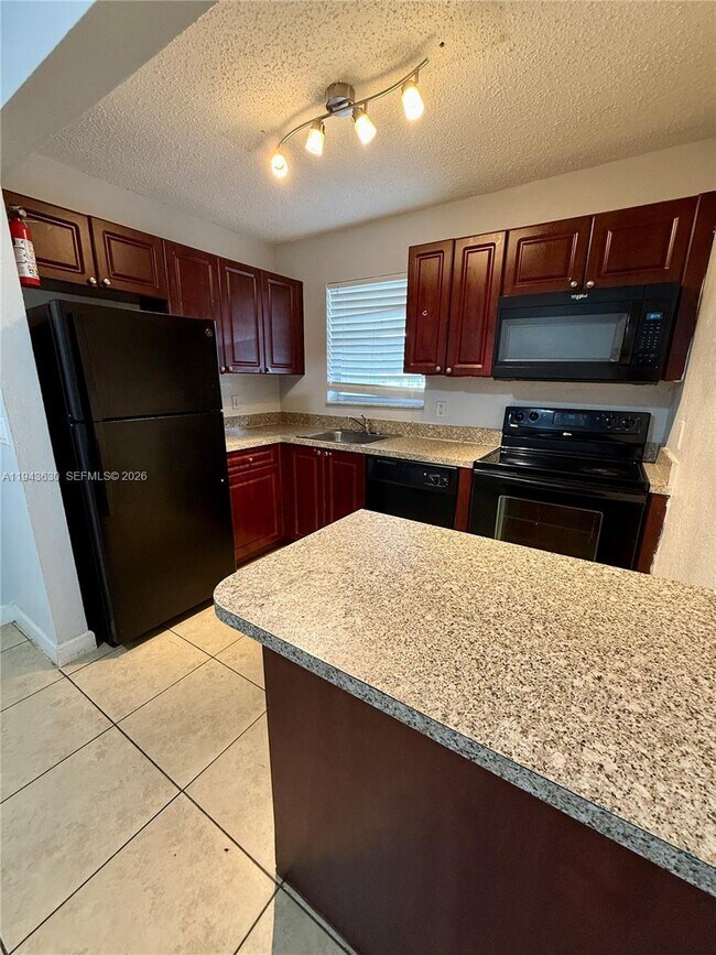 Building Photo - 400 NW 65th Ave