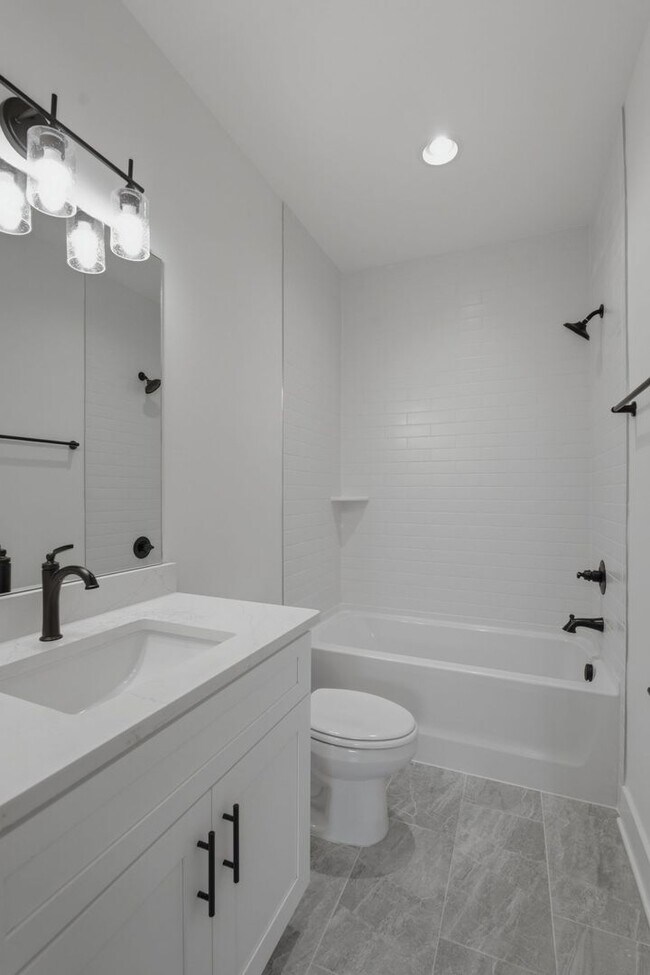 Building Photo - Spacious 5-Bedroom with Fenced Yard & Modern Amenities