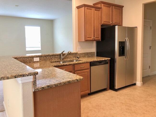 Building Photo - Beautiful 3/2 Spacious Home with a Covered...
