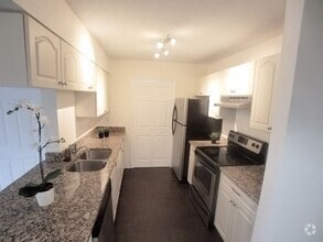 Building Photo - Beautiful 1/1 Wood Floor Condo With a Beau...